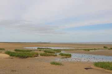 Idyllische Landschaft im niedersächsischen Wattenmeer der Nordsee in Cuxhaven mit Blick Richtung...