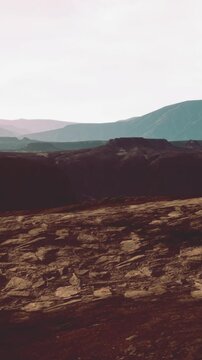 black volcanic basalt rock formations in the low light