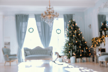 Cozy living room adorned for Christmas with tree lights and decorations