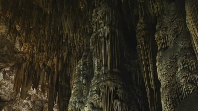 Interior view of the Caves of Nerja,  Malaga, Spain, June 2024. Natural work of art with beautiful stalactites, stalagmites and other rock formations. 