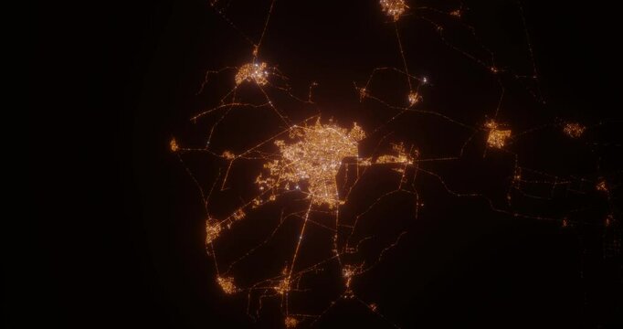Chiclayo (Peru) aerial view at night. Top view on city from space. Camera is zooming in, rotating clockwise