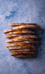 Sliced bread on blue backgrouns