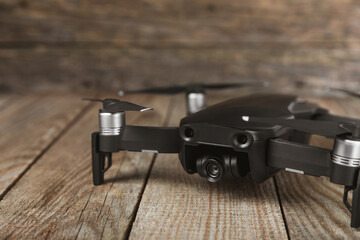 Drone unmanned aircraft on textured background. Modern FPV drone on background. The drone...