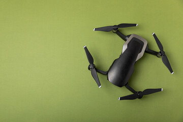 Drone unmanned aircraft on textured background. Modern FPV drone on background. The drone...