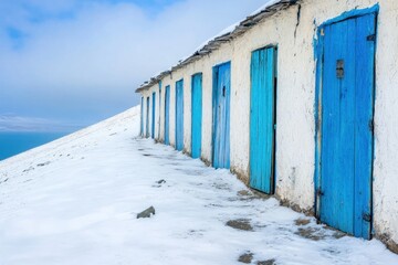 Fototapeta premium An Enchanting Hillside Adorned With Colorful Doors Against a Snowy Backdrop