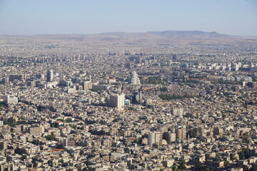 Damascus, Syria - June 1, 2023: Skyline of Damascus from Mount Qasioun  © Alex