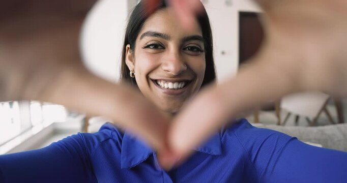 Close up happy faces, changing portraits of diverse multiethnic young and aged people showing to camera heart symbol. I love you sign, human connection across cultures and generations, share humanity