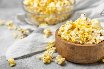 Salty popcorn on bright color background. Cinema and entertainment concept. Movie night with popcorn. Delicious appetizer, snack.Space for text, copy space. Banner