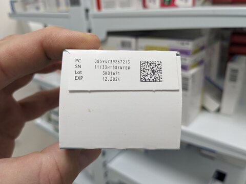 QR code on medicine box. Falsified Medicines Directive. FMD. Unique identifier and an anti-tampering device on drug. Medicine box and blister closeup - macro	