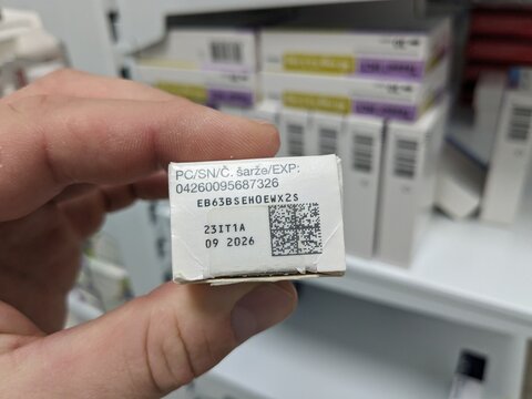 QR code on medicine box. Falsified Medicines Directive. FMD. Unique identifier and an anti-tampering device on drug. Medicine box and blister closeup - macro	