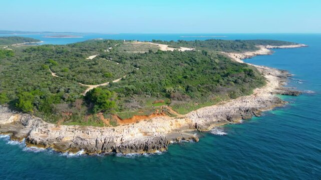 Rt Kamenjak is a stunning peninsula located near Pula, Croatia. Renowned for its rugged coastline, crystal-clear waters, and numerous small islands, it offers breathtaking aerial views