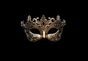  Gold carnival mask on a black background © Tanish