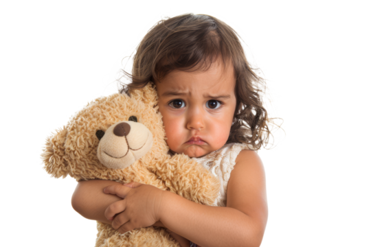 A little girl with a pout and a furrowed brow, clutching her favorite toy tightly.
