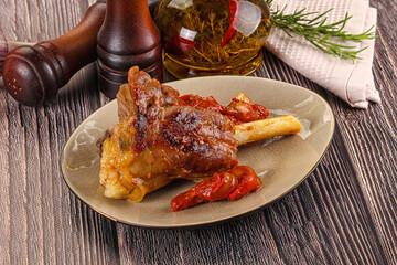 Baked lamb shank with vegetables