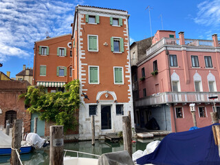 Venetian waterfront houses on Canal in Chioggia, ITaly