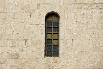 Old wooden window in masonry wall