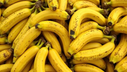 Fresh yellow bananas stacked together, vibrant fruit display, healthy food concept, copy space
