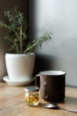 cup of tea with honey and nuts