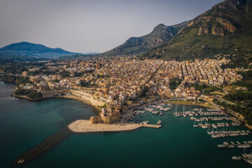 Fototapeta premium Castellammare del Golfo, Sicily, Italy. June 2023, sunny early morning. Aerial drone picture.