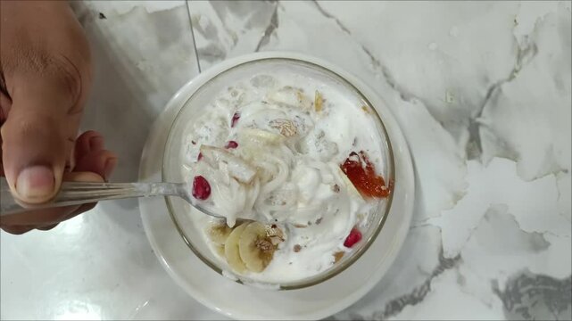 Delicious dessert Falooda. A popular Bangladeshi dessert item. It contains a mixture of various fruits and ice cream.