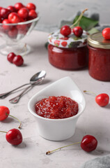 Homemade cherry jam with gelatin in white bowl