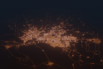 Aerial shot of Torreon (Mexico) at night, view from south. Imitation of satellite view on modern city with street lights and glow effect. 3d render
