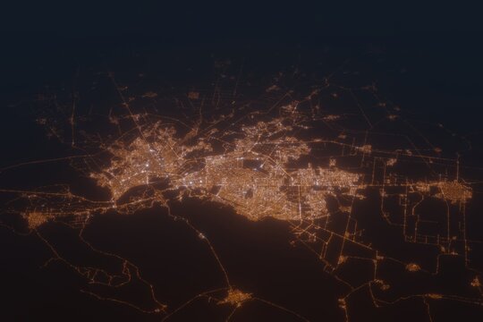 Aerial shot of Torreon (Mexico) at night, view from south. Imitation of satellite view on modern city with street lights and glow effect. 3d render