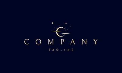 Vector golden logo with an abstract image of the moon against a background of stars and clouds.