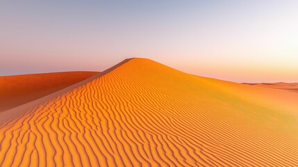 A serene desert landscape at sunset, showcasing sweeping sand dunes bathed in warm orange hues under a clear sky.