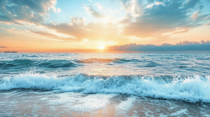 Sunrise over the ocean with gentle waves lapping along the shore at a tranquil beach during early morning light