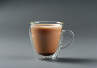 Hot milk tea ir chai served in cup isolated on grey background, chinese hot drink