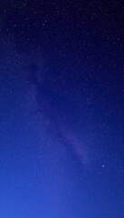 Fototapeta premium starry sky with a few stars above a field on a clear magnificent night sky