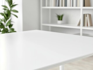 Fototapeta premium An overhead, photo-realistic close-up of a white table under bright studio light, with a bookshelf in the background, creating a clean and modern visual perfect for design displays