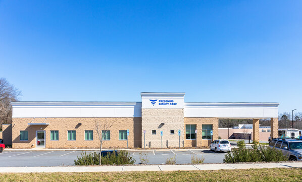 NEWTON, NC, USA-3 MARCH 2022:  Fresenius Kidney Care, a dialysis center, part of Fresenius Medical Care North America, shows building, sign and parking lot.  Sunny day.