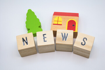 NEWSと書かれた積み木