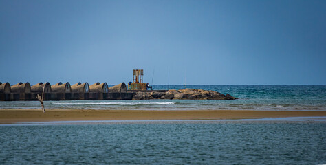 Fototapeta premium people fishing on the expoes in the sea