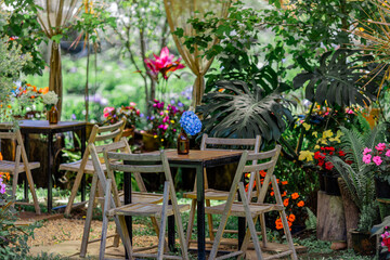 Flower garden landscape background, garden decoration in cafes and restaurants, for beauty and a photo corner for customers to relax and unwind their eyes.