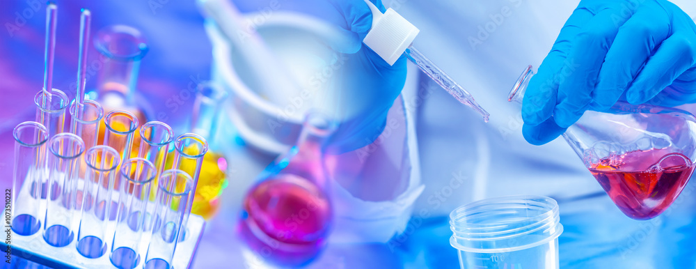 Poster laboratory assistant hands over test tubes. desk of biologist. chemist hands and laboratory glasswar