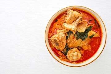 Chicken red curry and bamboo shot on white background, thai cuisine