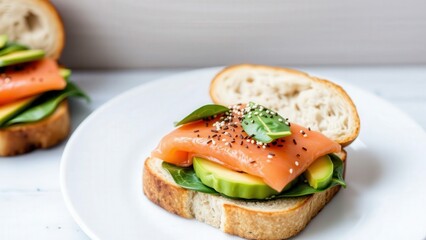 Gourmet Smoked Salmon Sandwich with Fresh Greens and Avocado on Artisan Bread - Perfect for a Healthy Lunch or Light Dinner