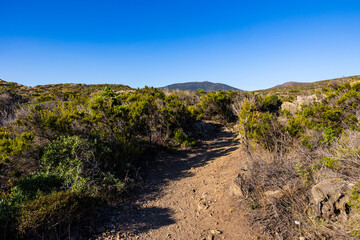 Summit of El Pení, overlooking Cadaqués, from the hiking trails of Cap de Creus