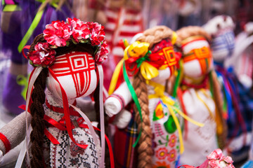 traditional Ukrainian folk dolls motanka on the table.Focal point