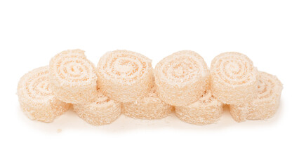 Coconut candy roll isolated on a white background.