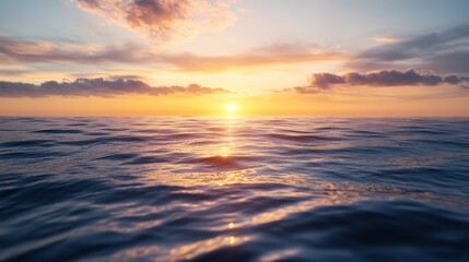 Obraz premium A serene ocean sunset captures the gentle waves reflecting warm hues of orange and pink, Ideal for travel promotions, relaxation themes, or nature projects, evoking peace and tranquility,