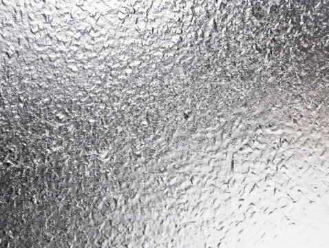 elegant silver gradient background with a subtle grainy texture, ideal for sophisticated designs and stylish presentations, exuding modernity and refinement