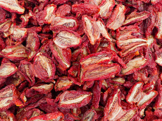 Heap of sundried tomatoes, top view close-up