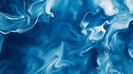 Obraz premium The image is a blue and white swirl of paint that looks like water