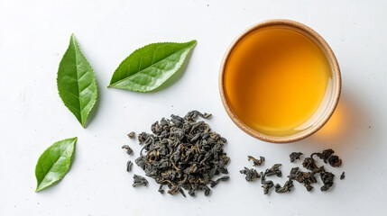 Tea leaves and teacups on white background, tea ceremony concept