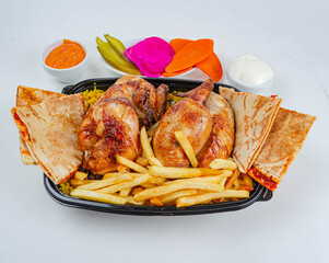 Syrian style grilled chicken meal on a white background
