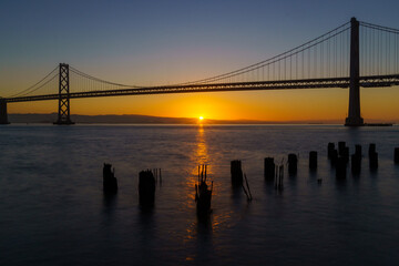 Obraz premium Sunrise at Oakland Bay Bridge in San Francisco, California, USA